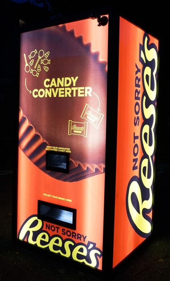 picture of machine that lets you give candies and get back reese's peanut butter cups