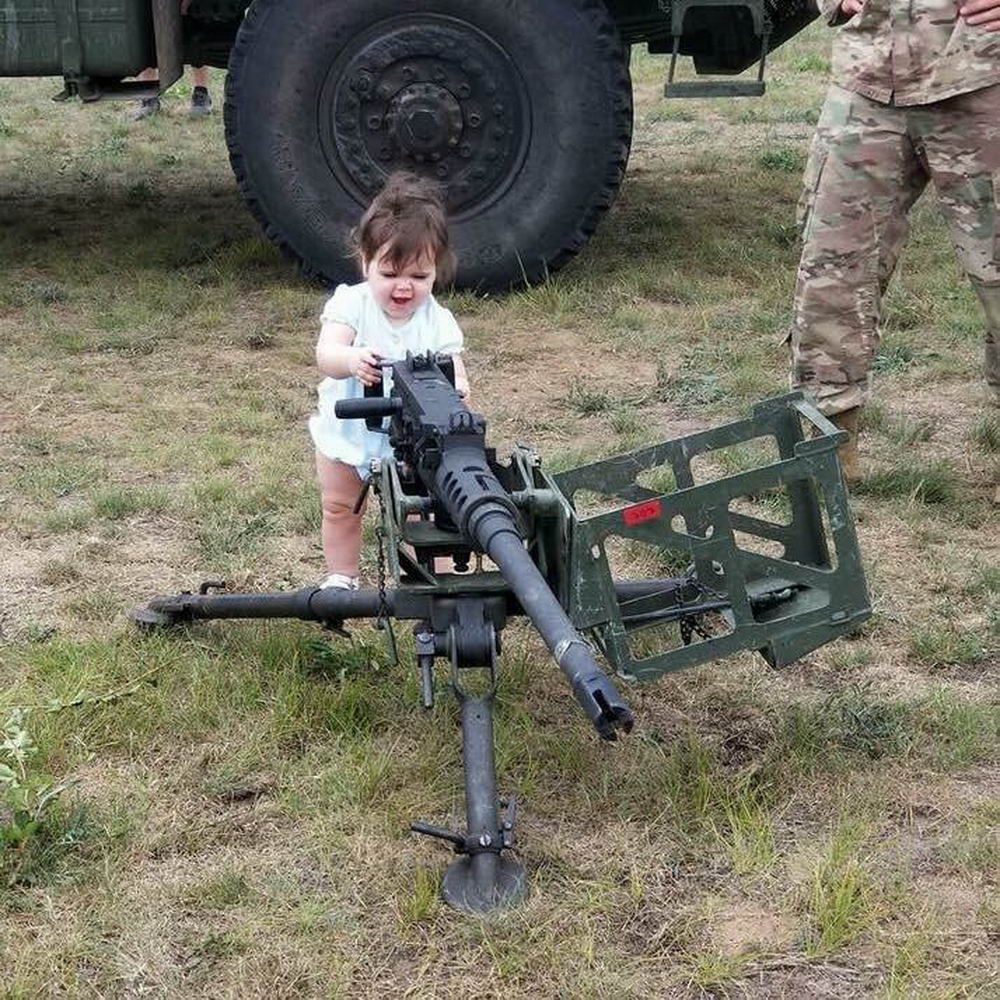 toddler with 50 cal