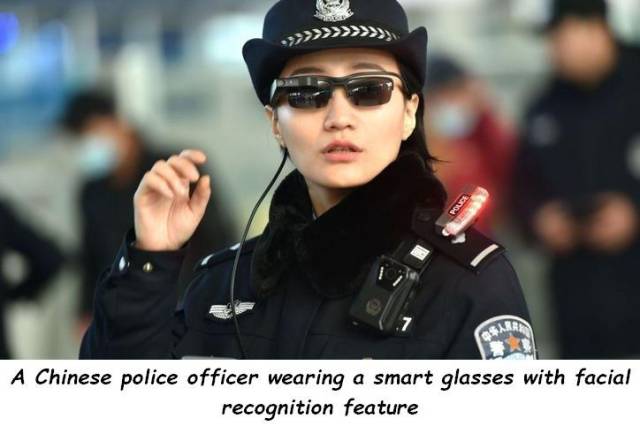 A Chinese police officer wearing a smart glasses with facial recognition feature