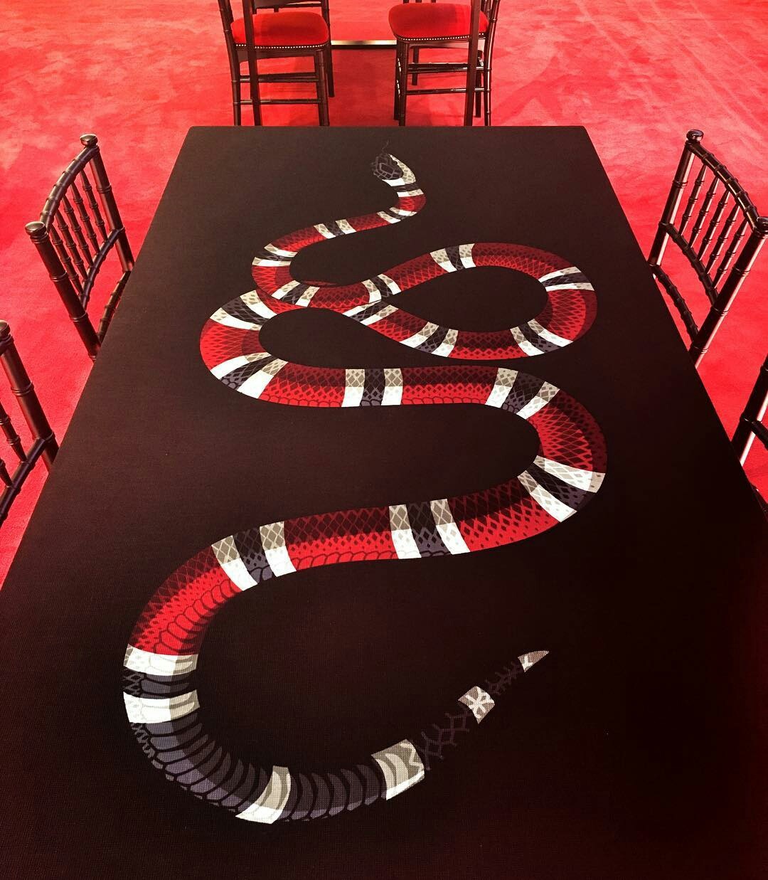 pic - table with a print of a snake on it
