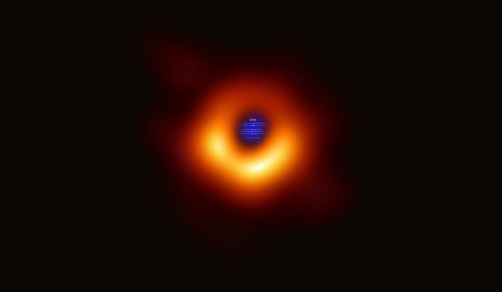 Black hole photo meme with the blue screen of death at the center.
