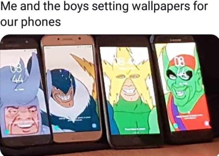 Photo of 4 cellphones each with a different Spiderman villain on it with the text 'me and the boys setting wallpapers for our phones'