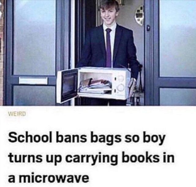 funny picture - Humour - Weird School bans bags so boy turns up carrying books in a microwave