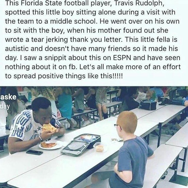 travis rudolph sits with kid - This Florida State football player, Travis Rudolph, spotted this little boy sitting alone during a visit with the team to a middle school. He went over on his own to sit with the boy, when his mother found out she wrote a te