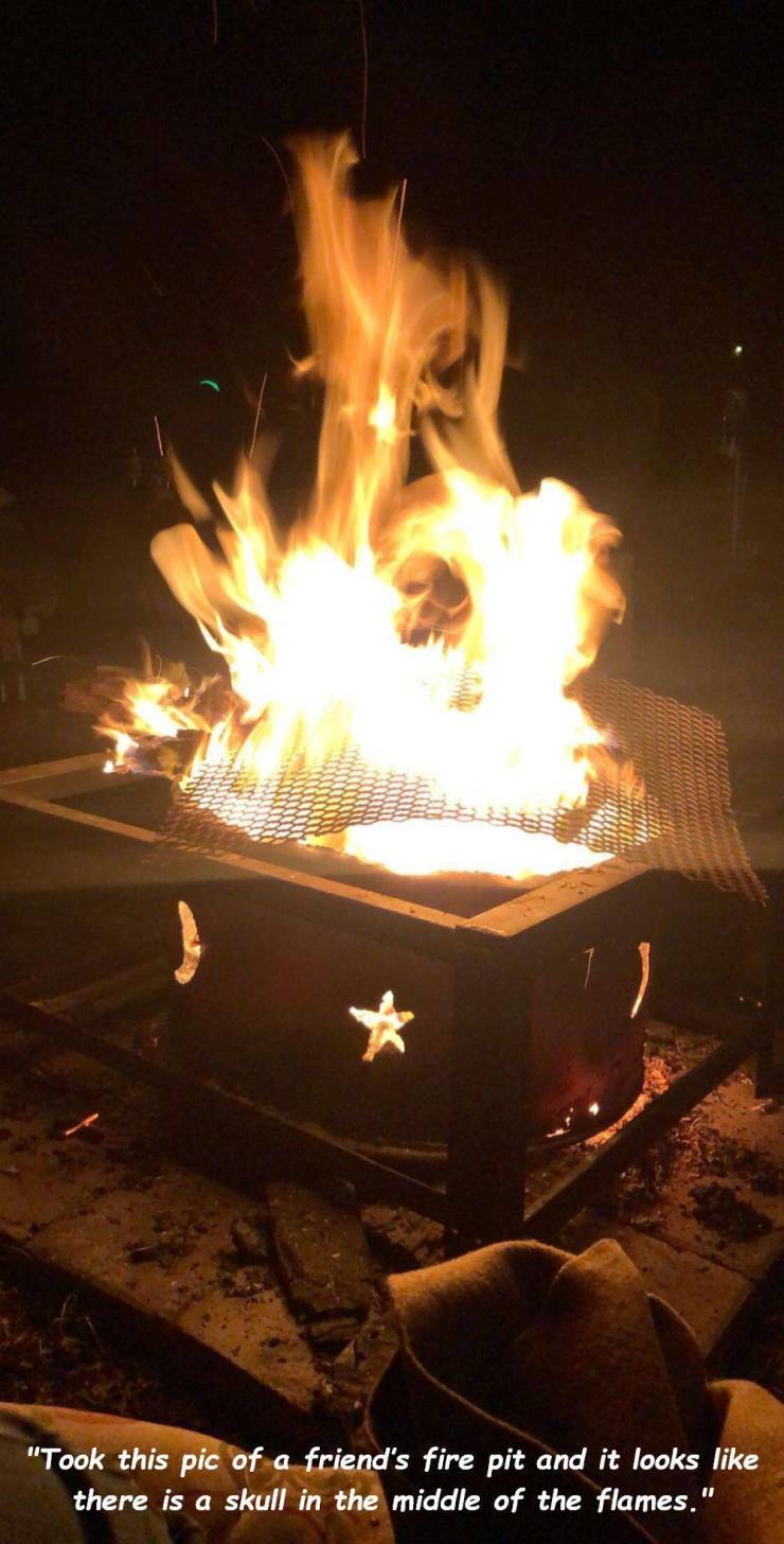 heat - w "Took this pic of a friend's fire pit and it looks there is a skull in the middle of the flames."