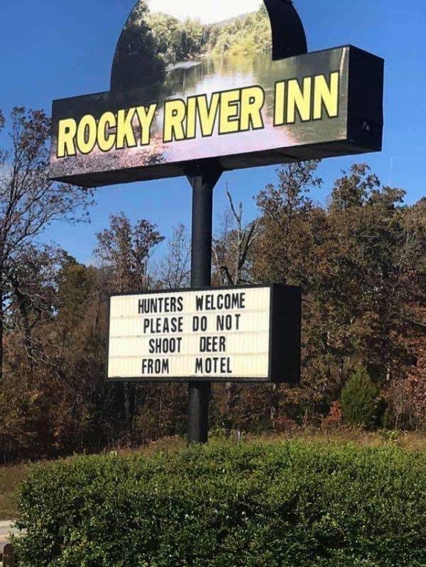 street sign - Rocky River Inn Hunters Welcome Please Do Not Shoot Deer From Motel
