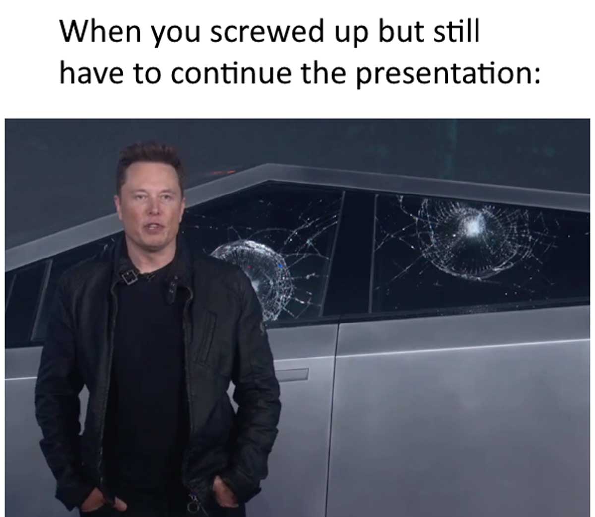 Photo of Elon Musk standing in front of the Cybertruck with smashed windows with the caption 'when you screwed up but still have to continue the presentation'