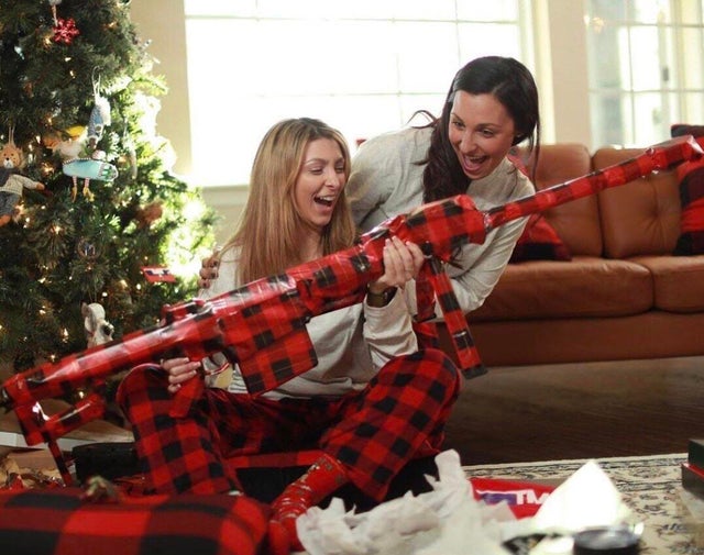 weird picture - gun wrapped in wrapping paper