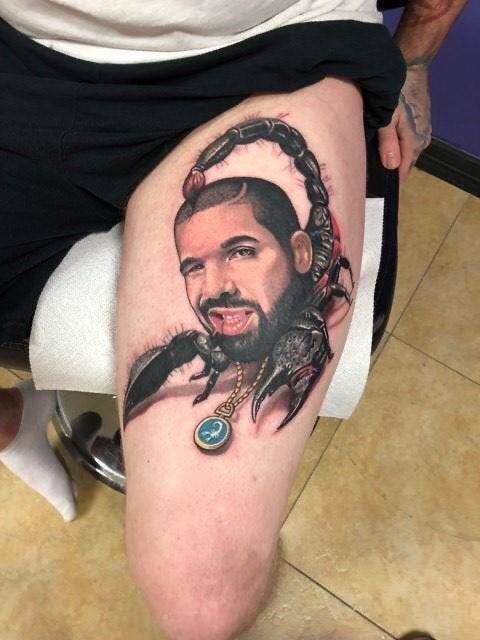 drake scorpion tattoo -