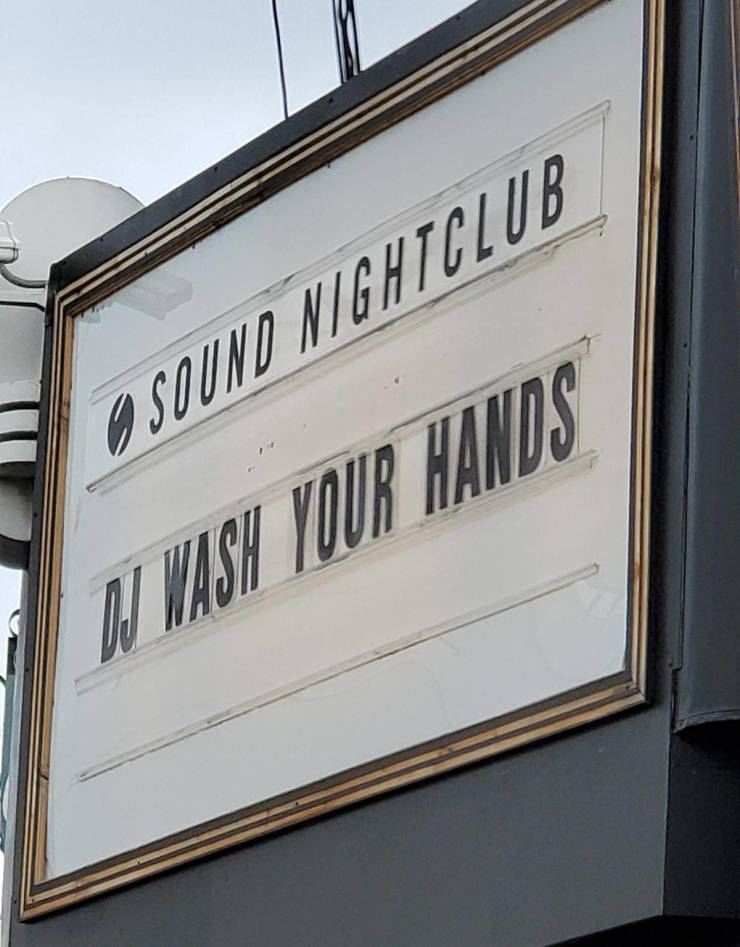 street sign - O Sound Nightclub 1 Wash Your Hands