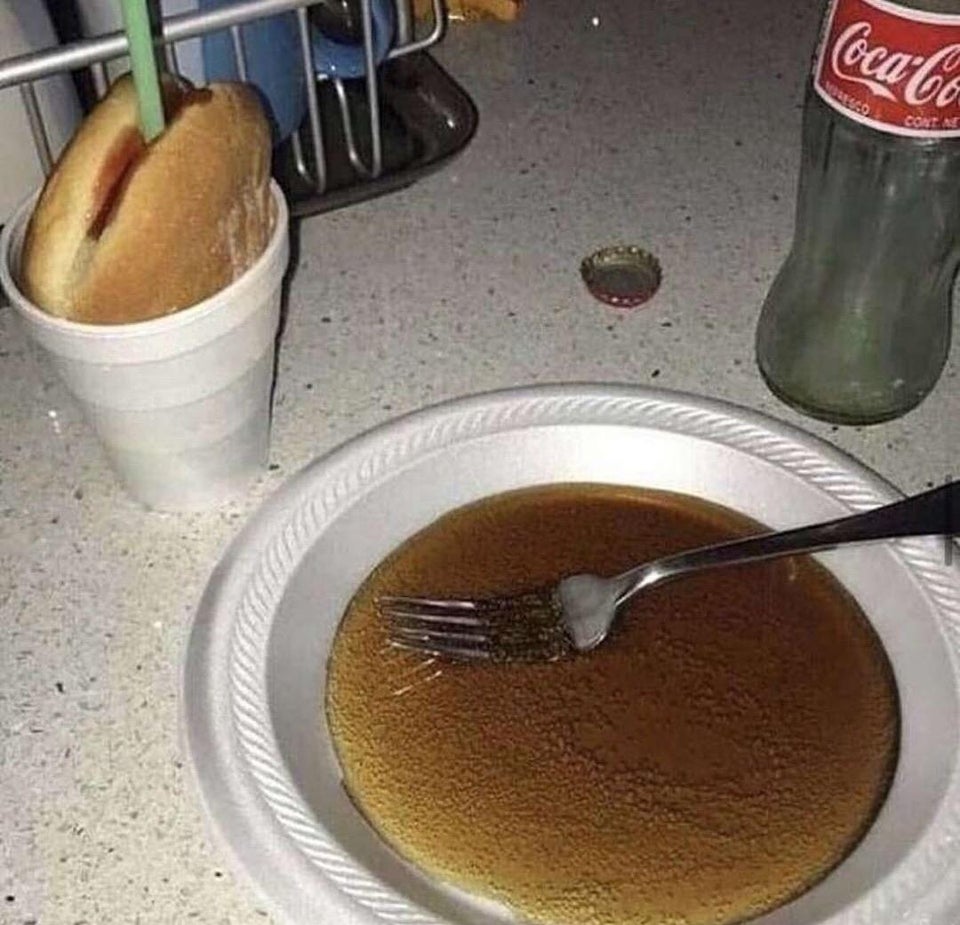 eating coca-cola with a fork off a plate