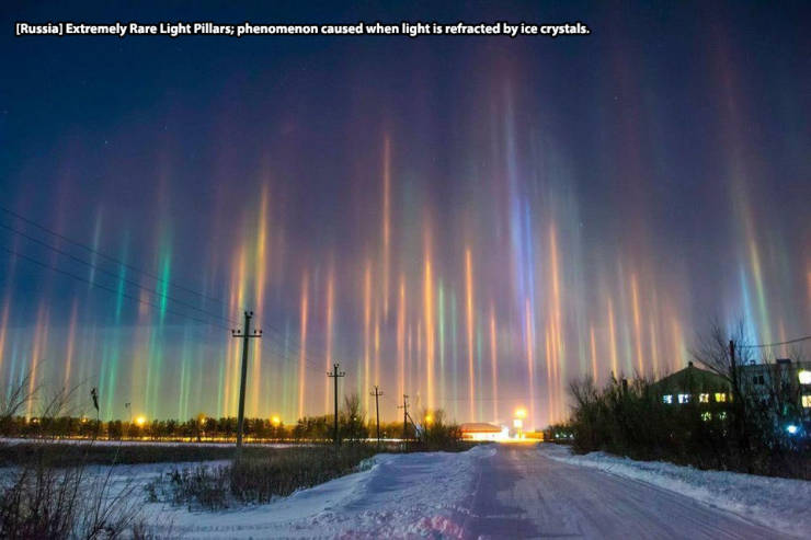 ice pillars - Russia Extremely Rare Light Pillars; phenomenon caused when light is refracted by ice crystals.
