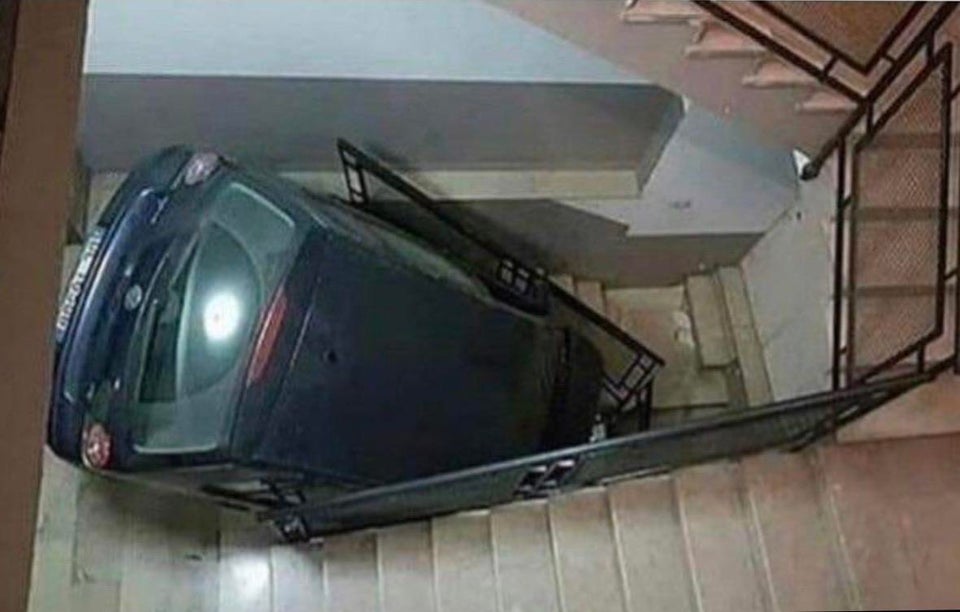 car parked inside a stairwell
