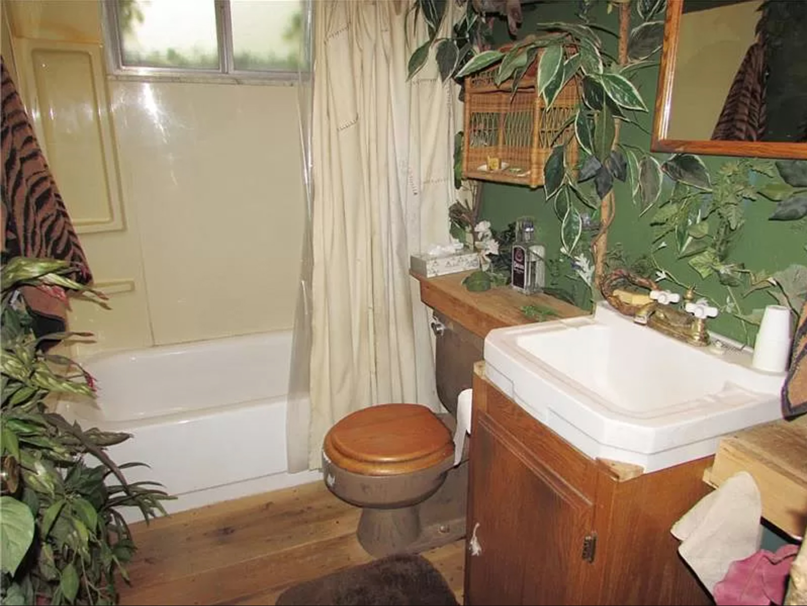 bathroom with vines and plants everywhere