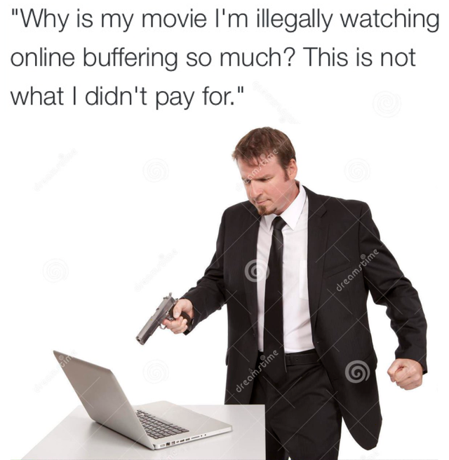 guy pointing gun at computer - "Why is my movie I'm illegally watching online buffering so much? This is not what I didn't pay for." Samace dreamstime dreamstime