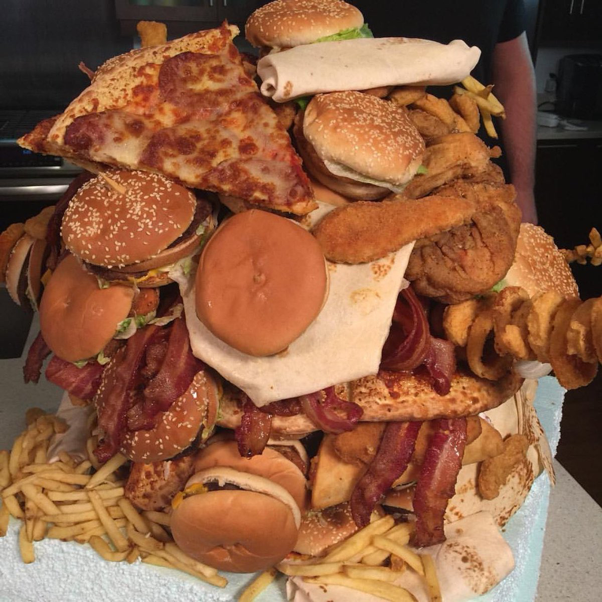 huge ball of fast food burgers pizza french fries fried chicken