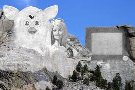 mt. rushmore with furby barbie hot wheels car etch-a-sketch