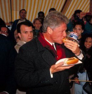 bill clinton eating a hot dog