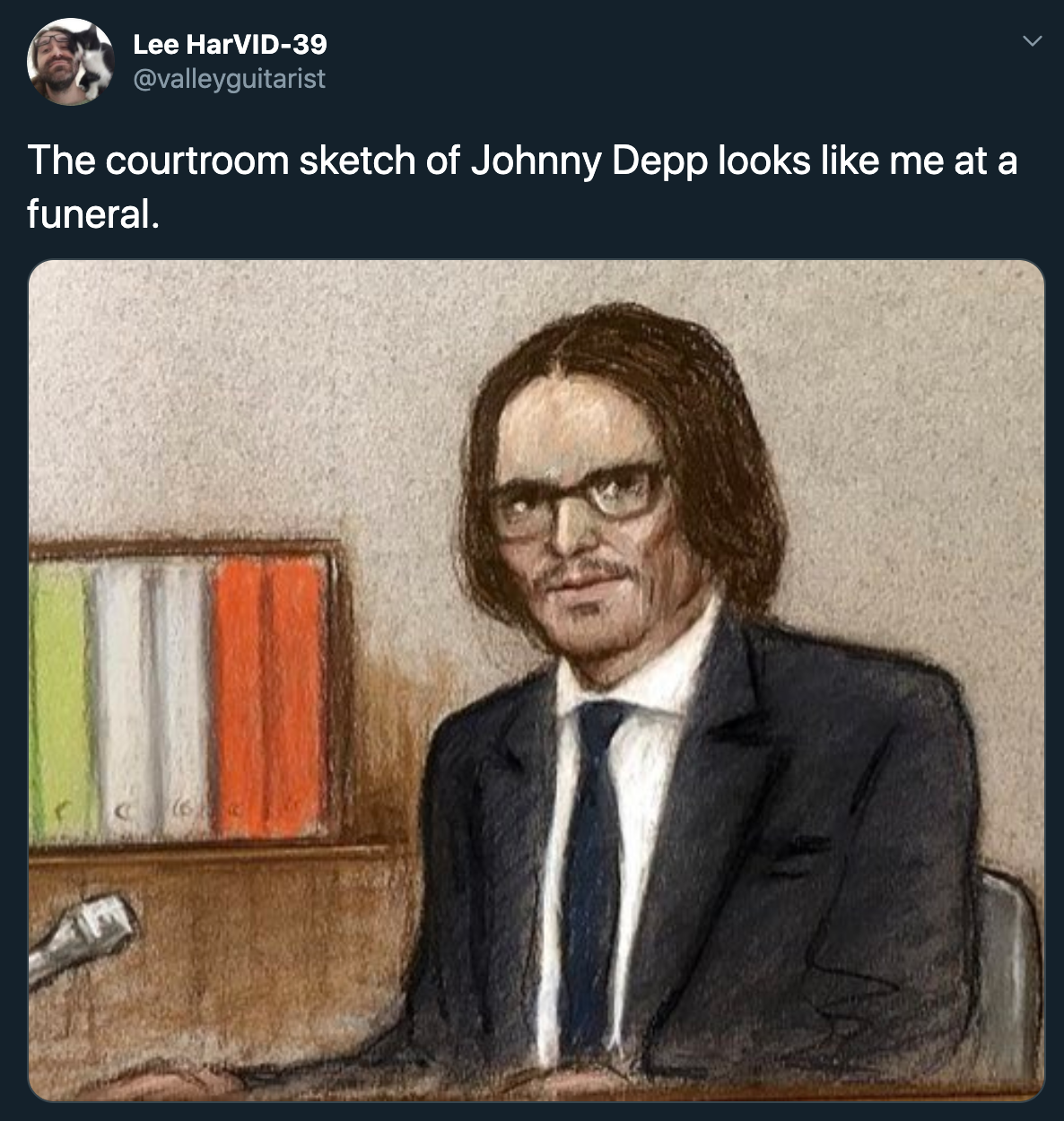 The courtroom sketch of Johnny Depp looks me at a funeral.
