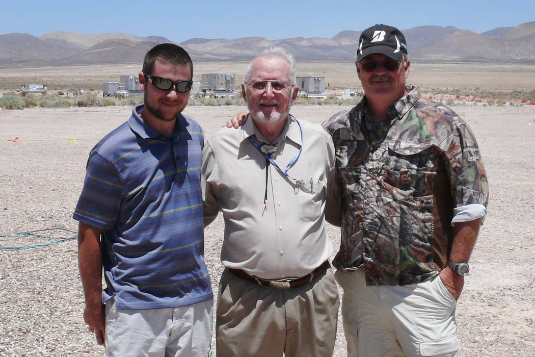 Robert Brownlee and two guys in the desert