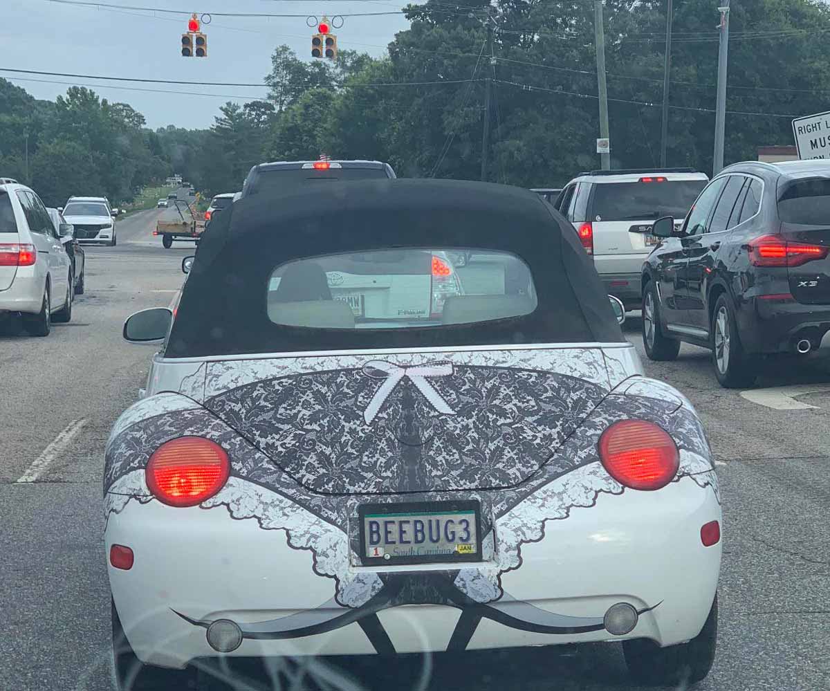 Funny decals on the back of a VW BUG that makes it look like it's wearing lacy underwear