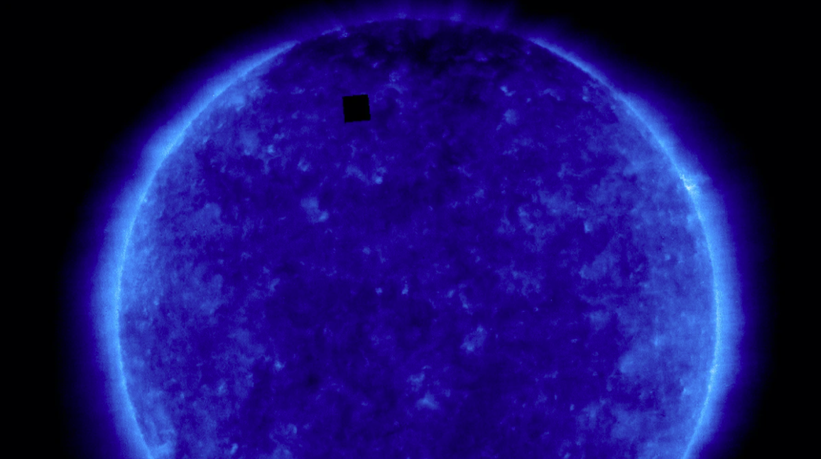 blue image of the sun - fake black alien space cube