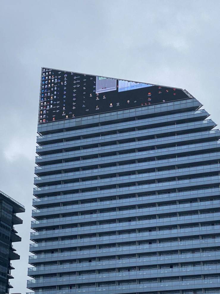 funny pics - skyscraper with screen of not working  but an error message