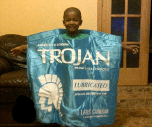 kid wearing a trojan condom halloween costume