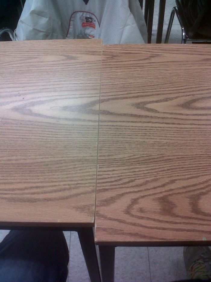 two wooden desks lining up