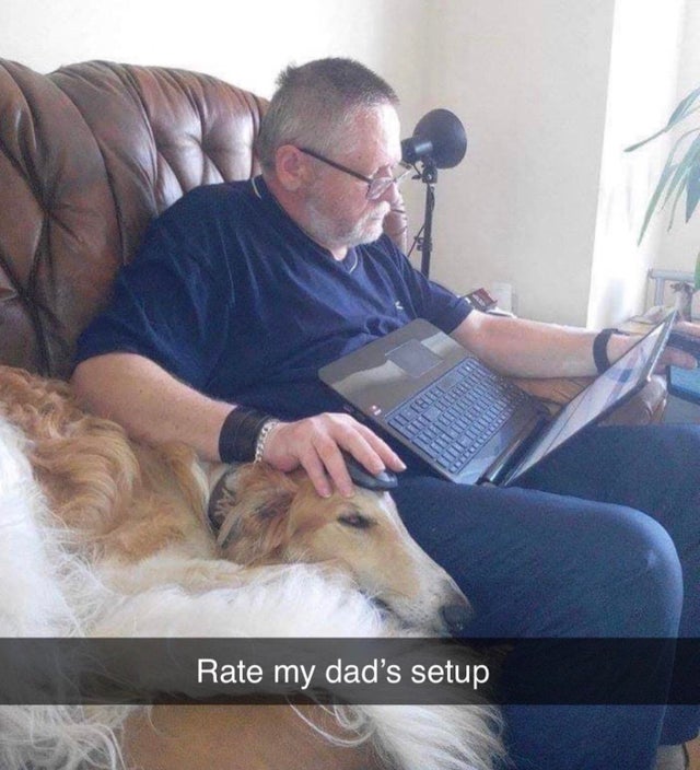old man using dog's head as his mousepad