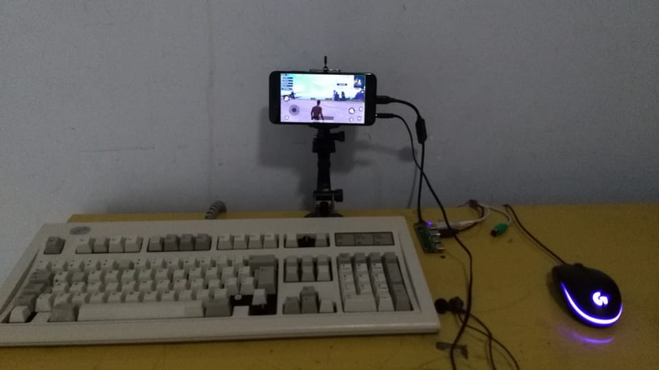 gaming setup on iphone with keyboard and mouse