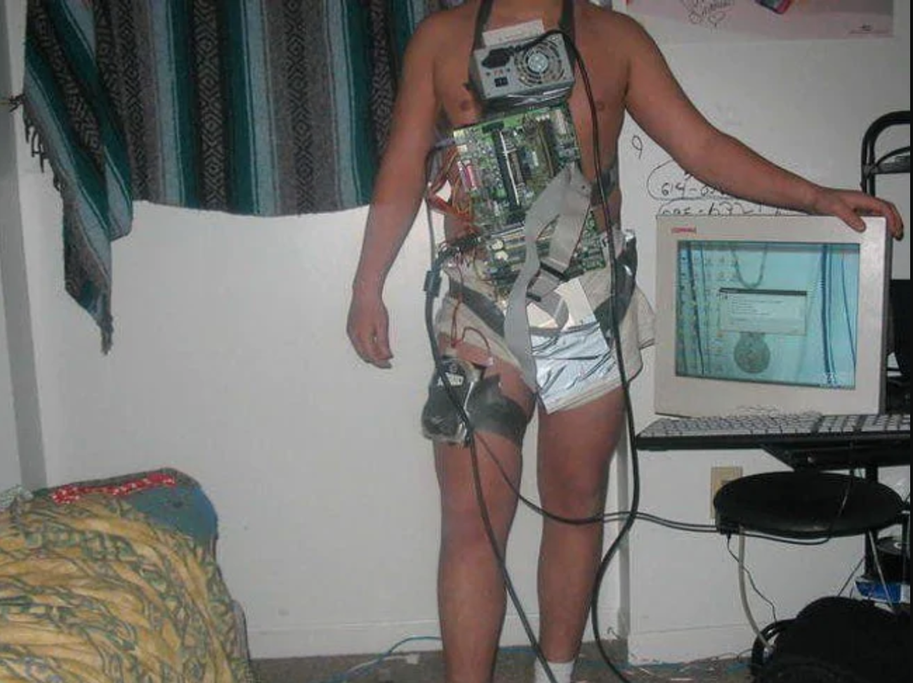guy who taped a computer to himself for his gaming setup