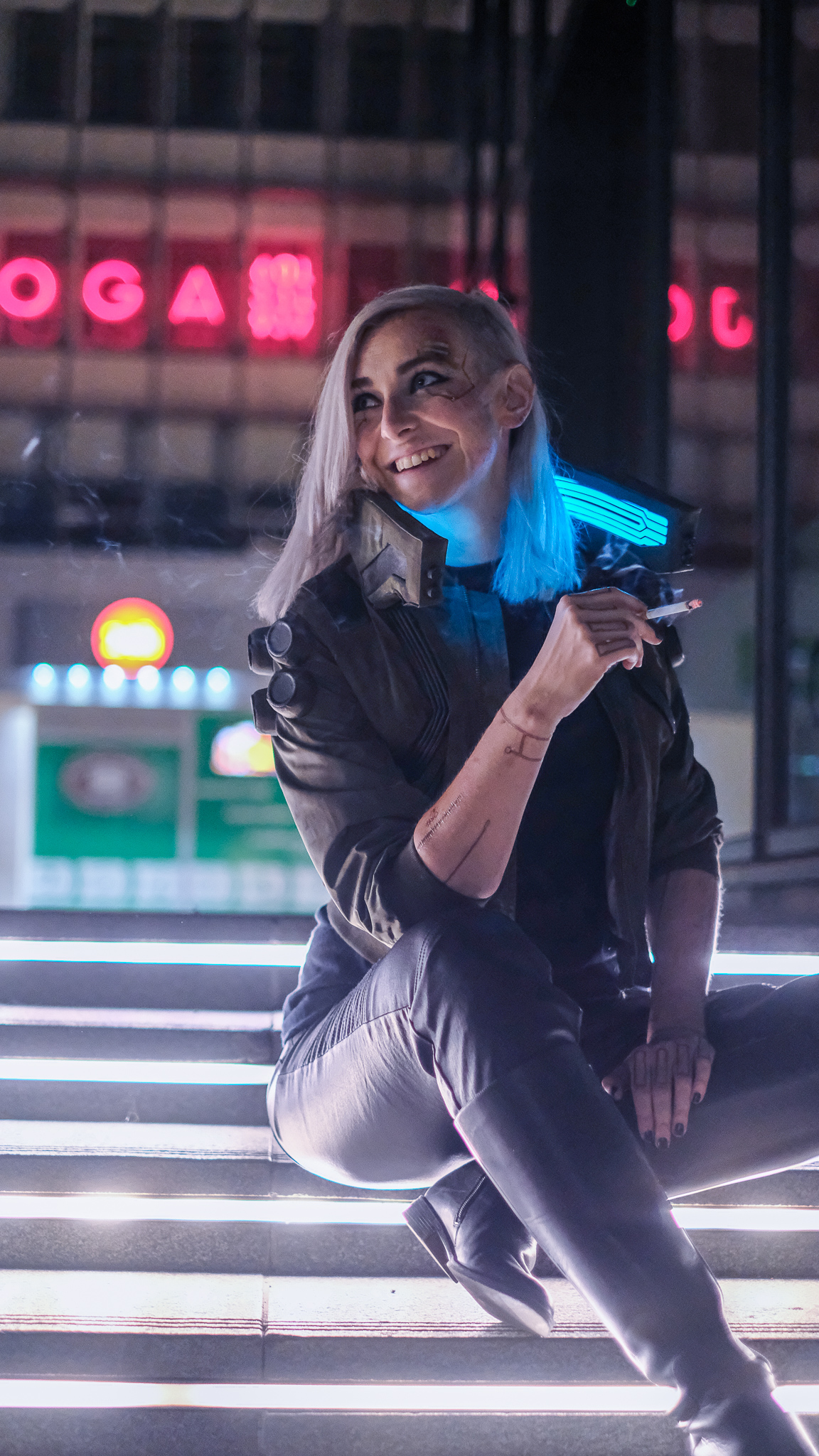 Cyberpunk 2077 - V Cosplay - Cyberpunk 2077 - V Cosplay - Alzbeta Trojanova smiling and looking over her shoulder