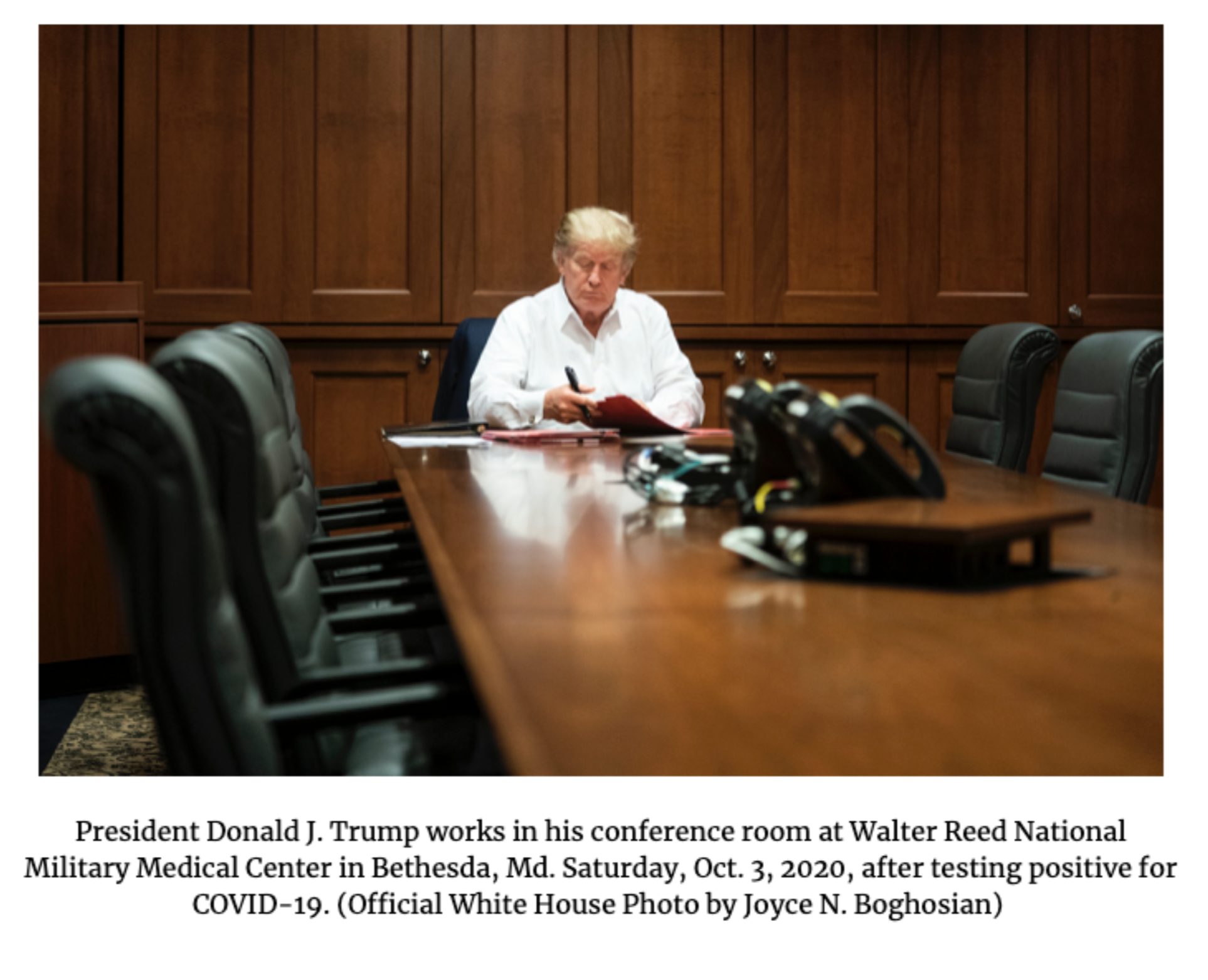photo caption - President Donald J. Trump works in his conference room at Walter Reed National Military Medical Center in Bethesda, Md. Saturday, Oct. 3, 2020, after testing positive for Covid19. Official White House Photo by Joyce N. Boghosian