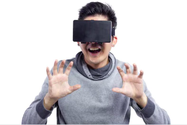 guy playing virtual reality headset