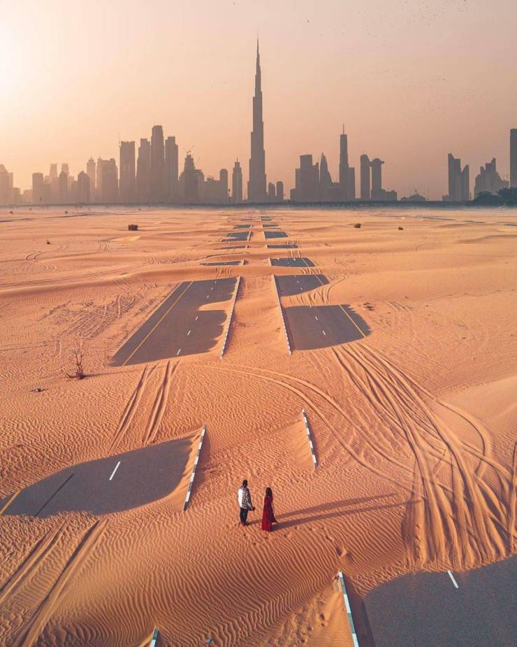 sand covered highway outside of Dubai