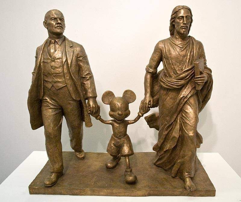 wtf pics - statue of mickey mouse holding hands with jesus and josef stalin
