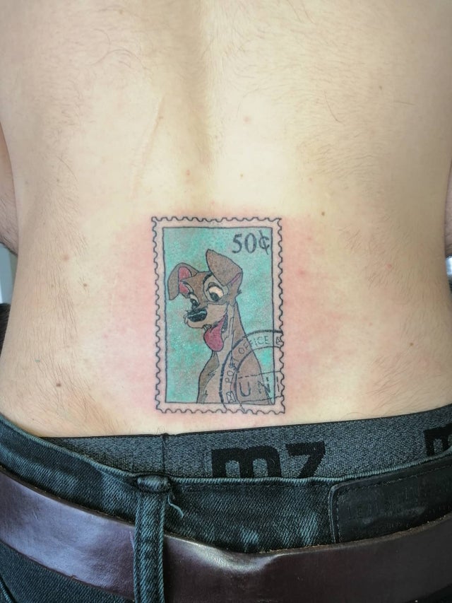 wtf pics - tramp stamp literal joke lady and the tramp postage stamp tattoo