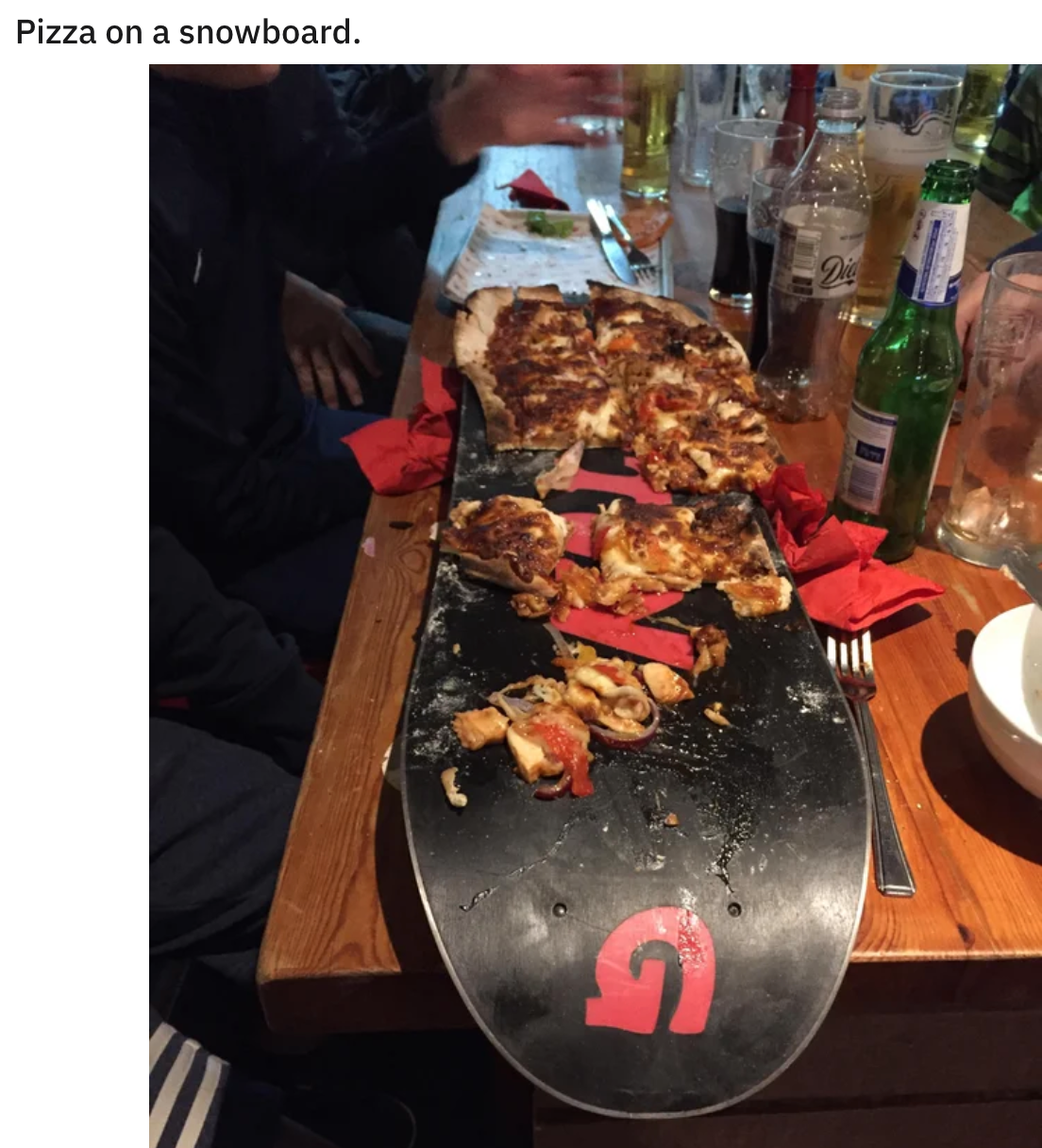 funny food pics - Pizza on a snowboard.