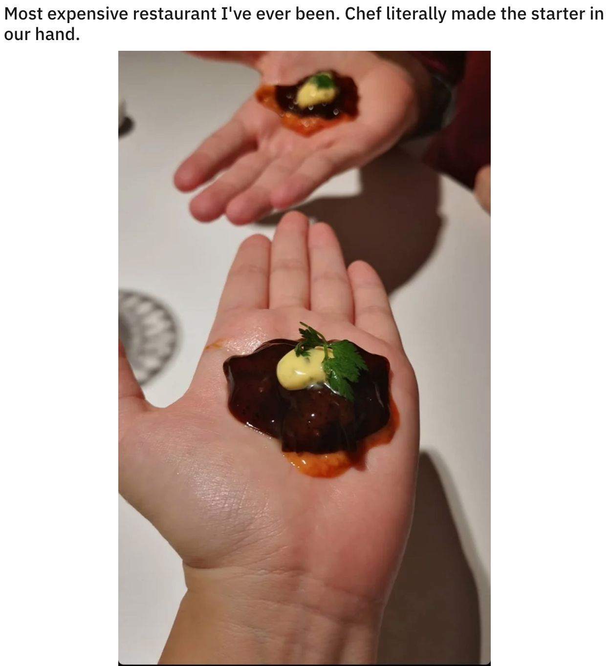funny food pics -- food served on hand - Most expensive restaurant I've ever been. Chef literally made the starter in our hand.