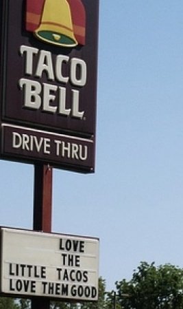 street sign - Taco Bell Drive Thru Love The Little Tacos Love Them Good