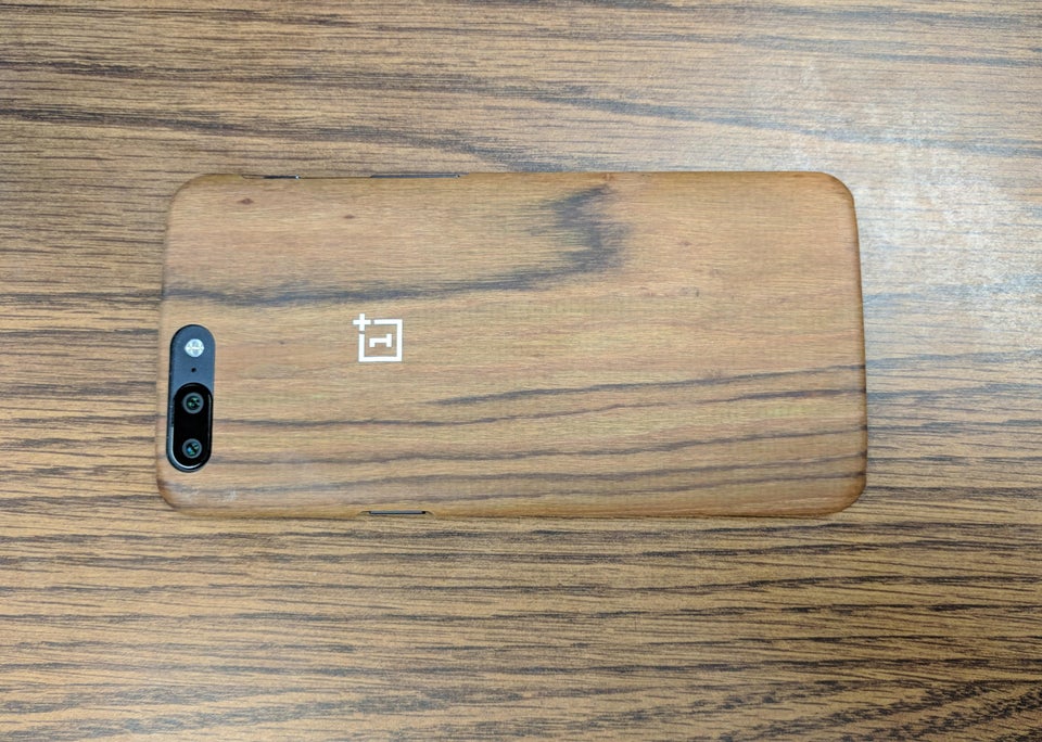 cool and funny pics - wooden phone case matches up with woodgrain in wooden table