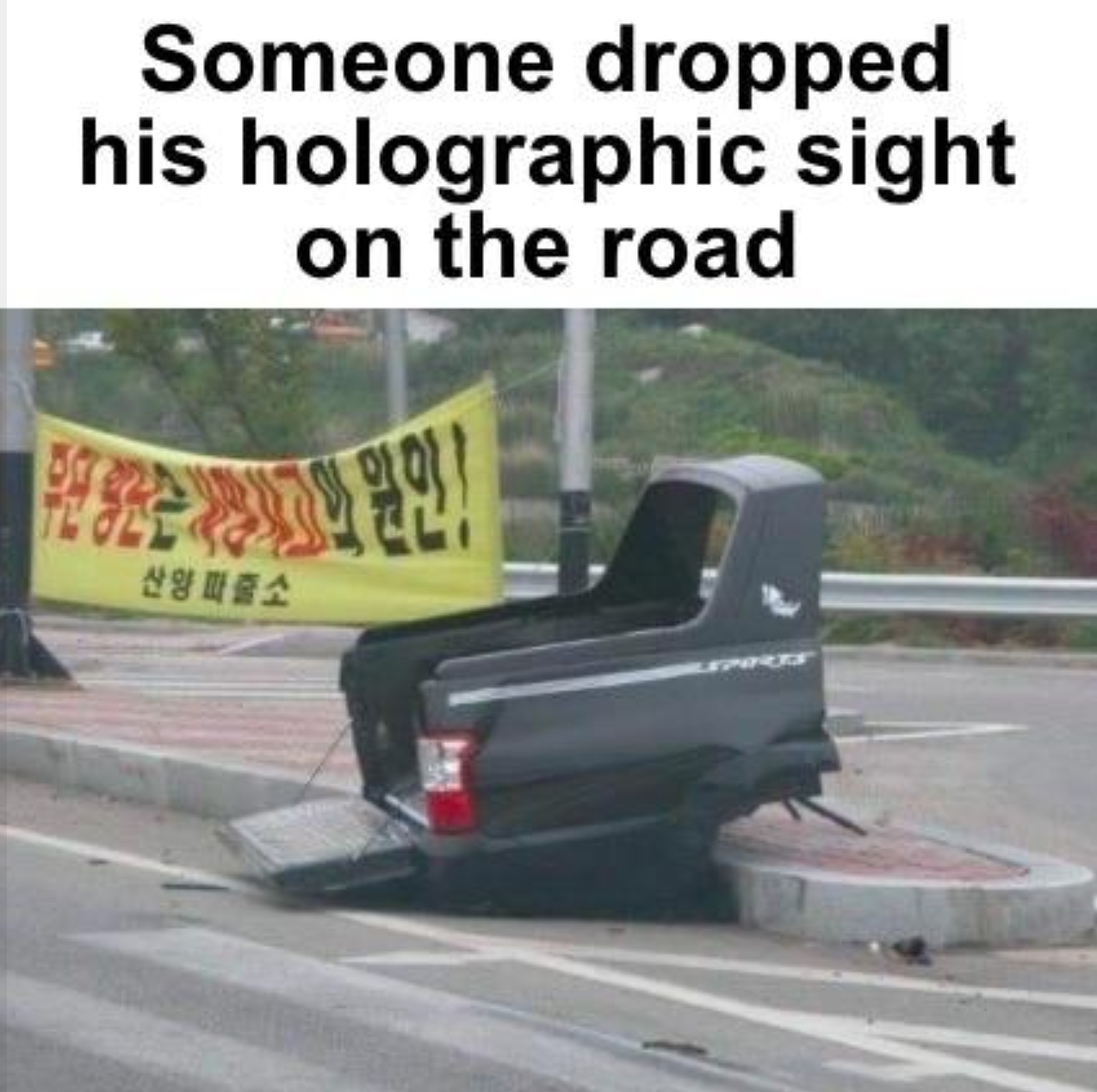 big hmmmm - Someone dropped his holographic sight on the road