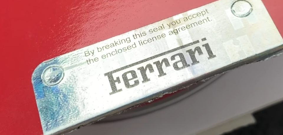 funny design fails - breaking this seal you accept the enclosed license agreement ferrari - By breaking this seal you accept the enclosed license agreement. Ferrari