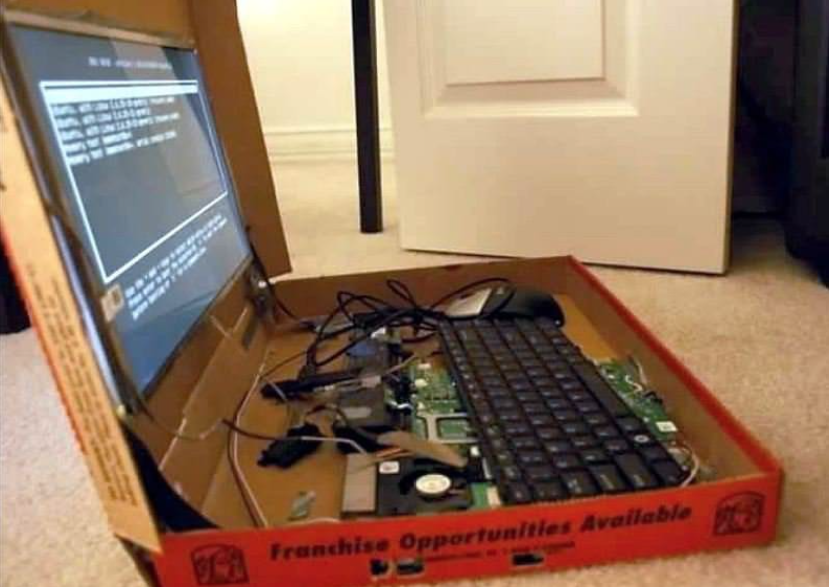 sad and disgusting gamer rigs - laptop in pizza box - Franchise Opportunities Available