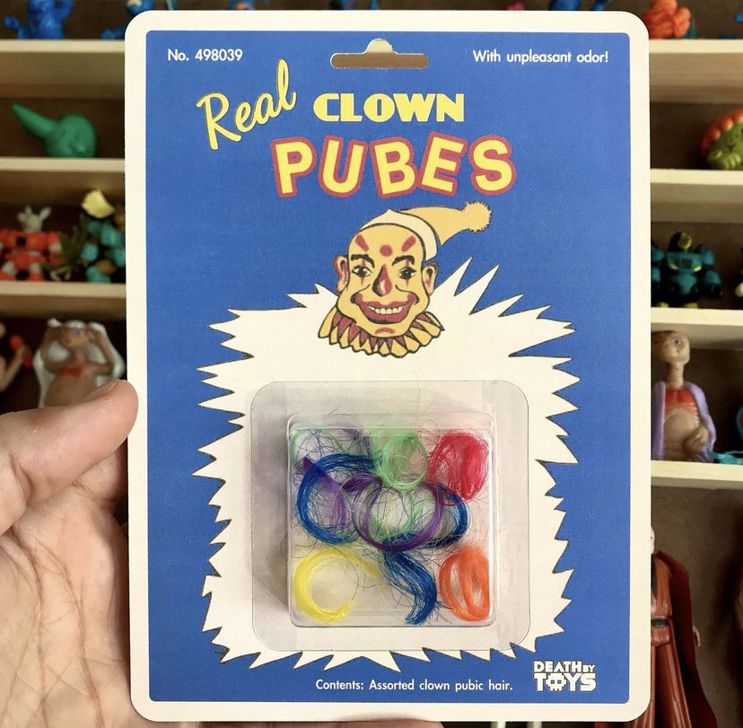 toy - No. 498039 With unpleasant odor! Clown Real Pubes Death Contents Assorted down pubic hair. Tys