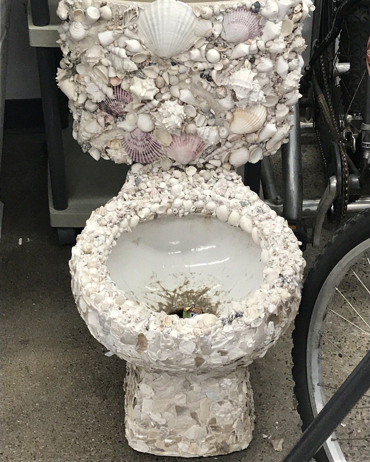 threatening bathrooms - seashell toilet