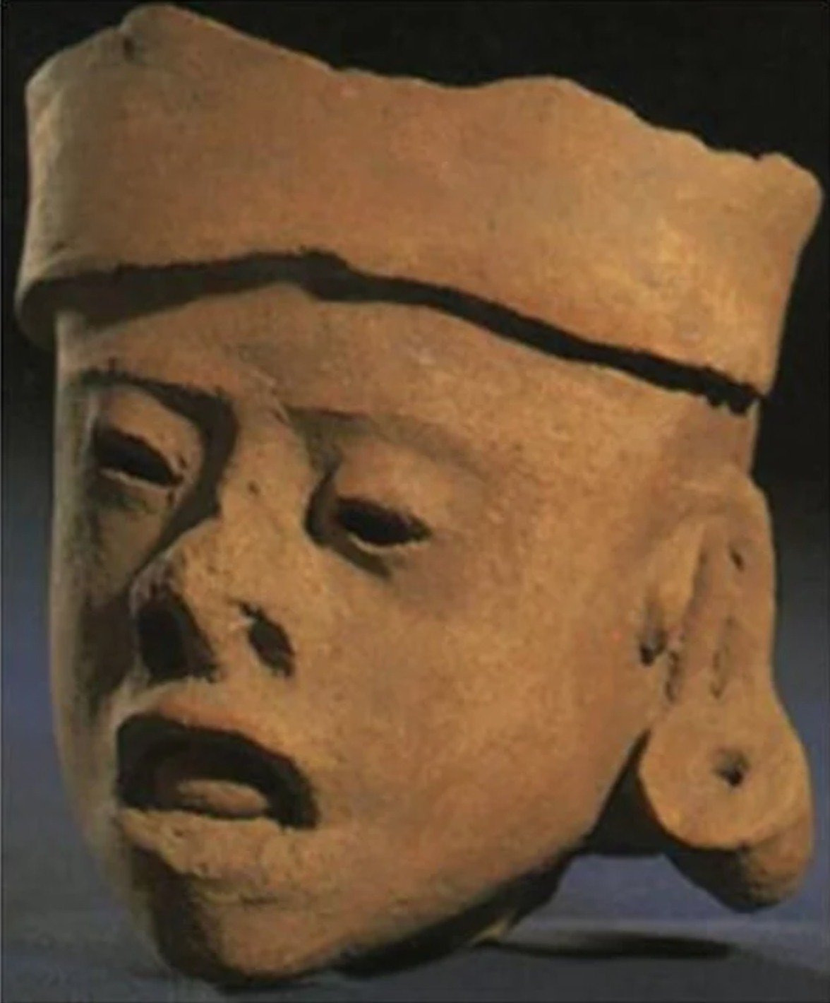 fascinating artifacts - A head fragment from a Toltec statue depicting a man with Down syndrome. (500 AD)