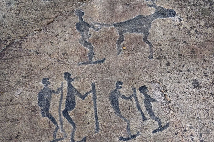 fascinating artifacts - Petroglyph depicting 5 skiers and a reindeer
