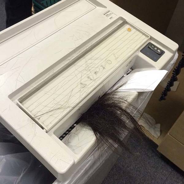 people having a bad day - hair caught in paper shredder - O